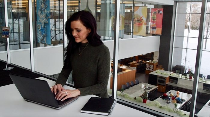 Tove Garber working on computer at General Mills