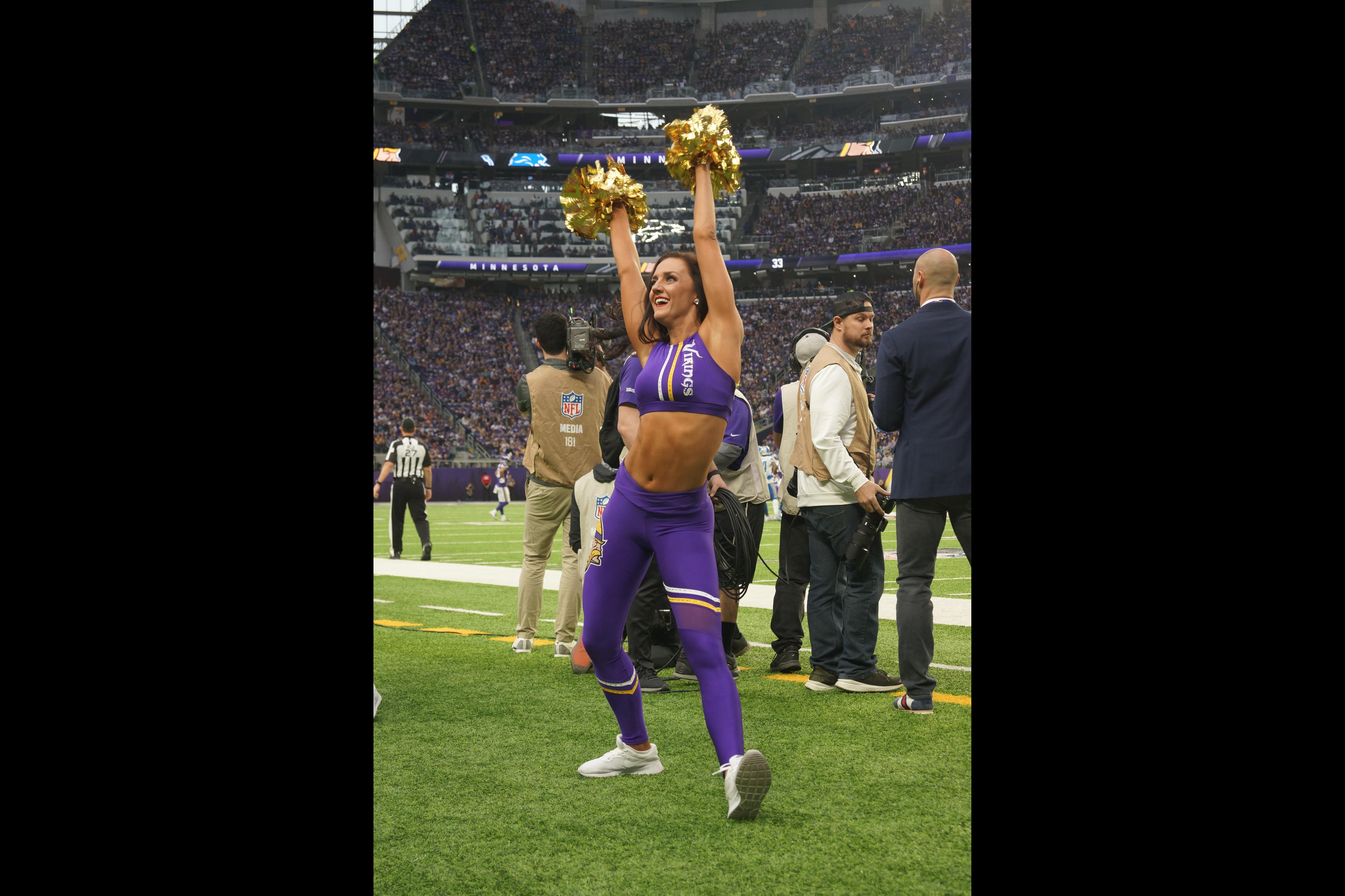 Tove Garber cheerleading on sideline