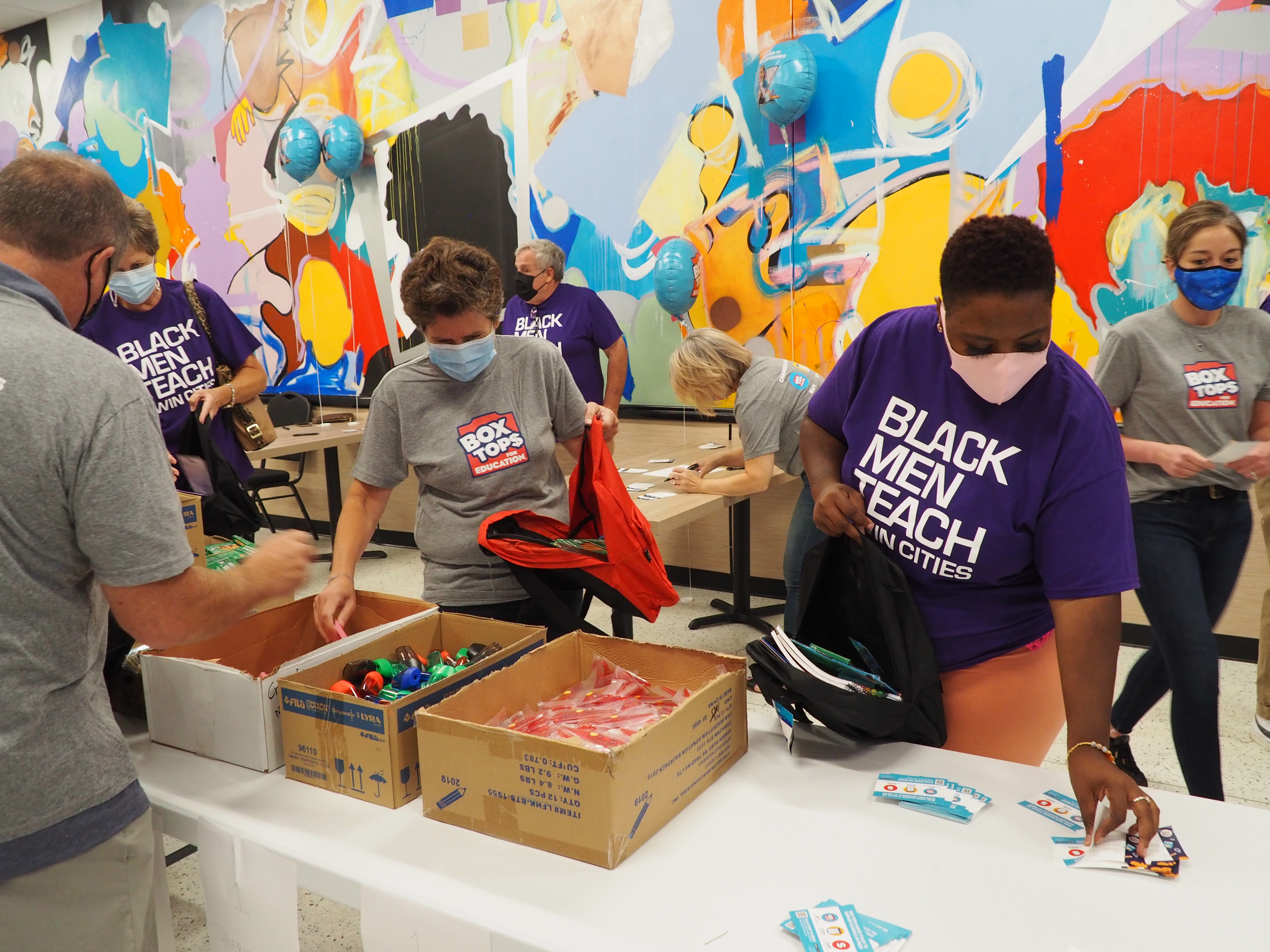 Box Tops with Black Men Teach Event Packing Care Packages